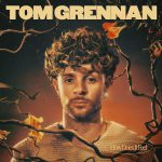 HOW DOES IT FEEL by TOM GRENNAN