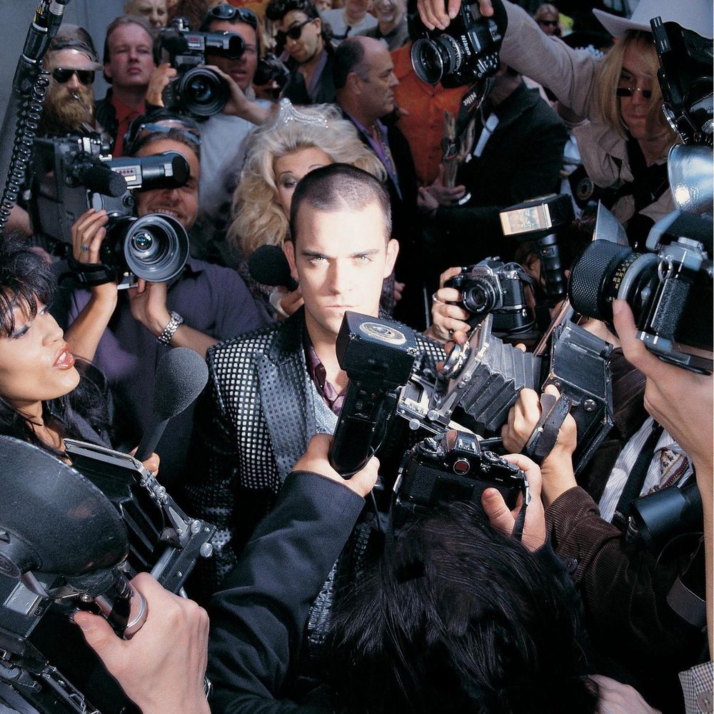 Let Me Entertain You by Robbie Williams